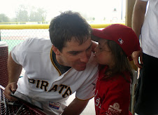 Chloe kisses Andy LaRoche at a Miracle League Game