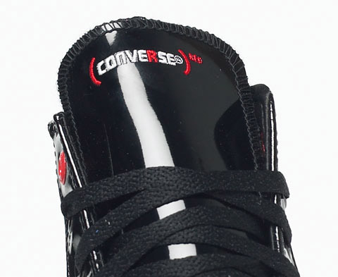[lupe-fiasco-converse-red-chuck-taylor-3.jpg]