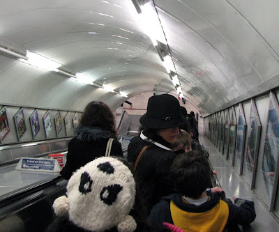Giant Panda Hat in London Underground