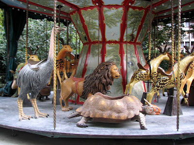 Extinct Atlas, Barbary, or Nubian lion and Extinct Horned Turtle on the Dodo Carousel, Paris, France