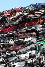 [JunkCarsInPile_Fotolia_16256357_XS.jpg]