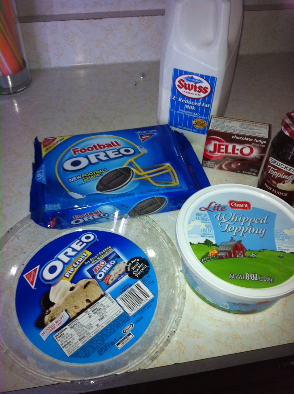 deceivingly domestic: Football Oreo Cake