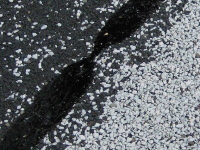 Close-up of asphalt shingle surface