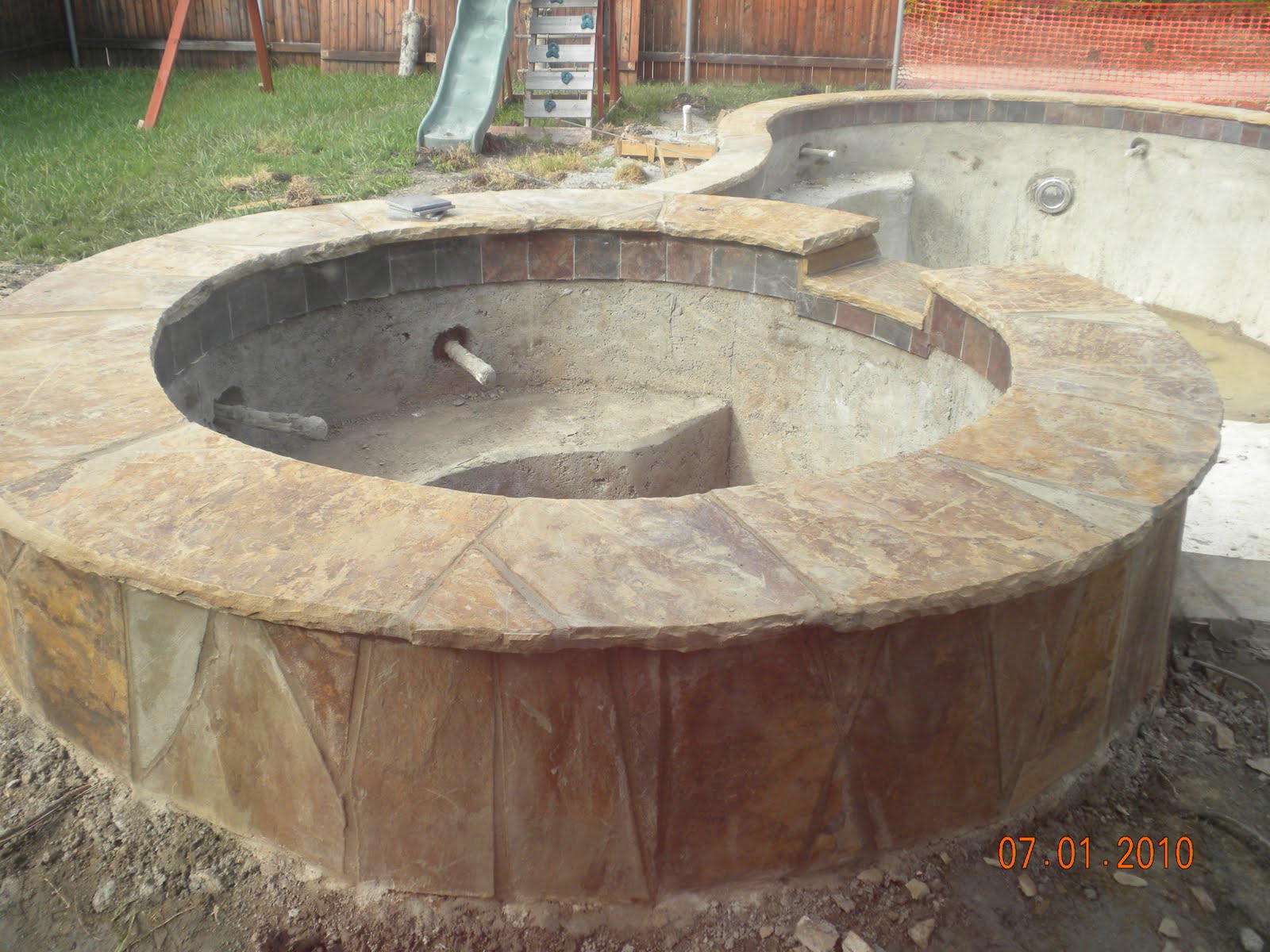 Madison's Pool Flagstone and tile completed!