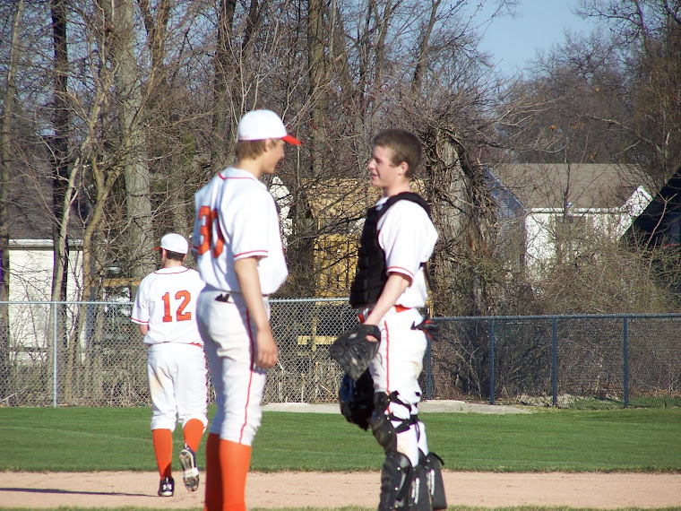 Adam Klepzig and Tyler Falor talk things over...