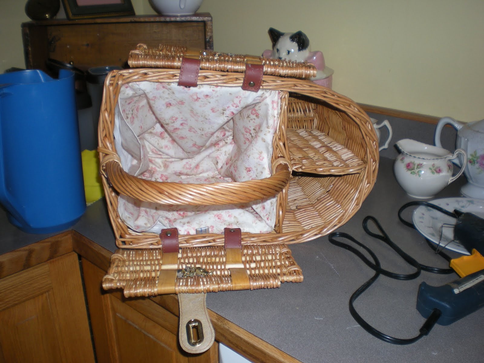 Laura's Rose Garden Revamping an old Wicker Picnic Basket.
