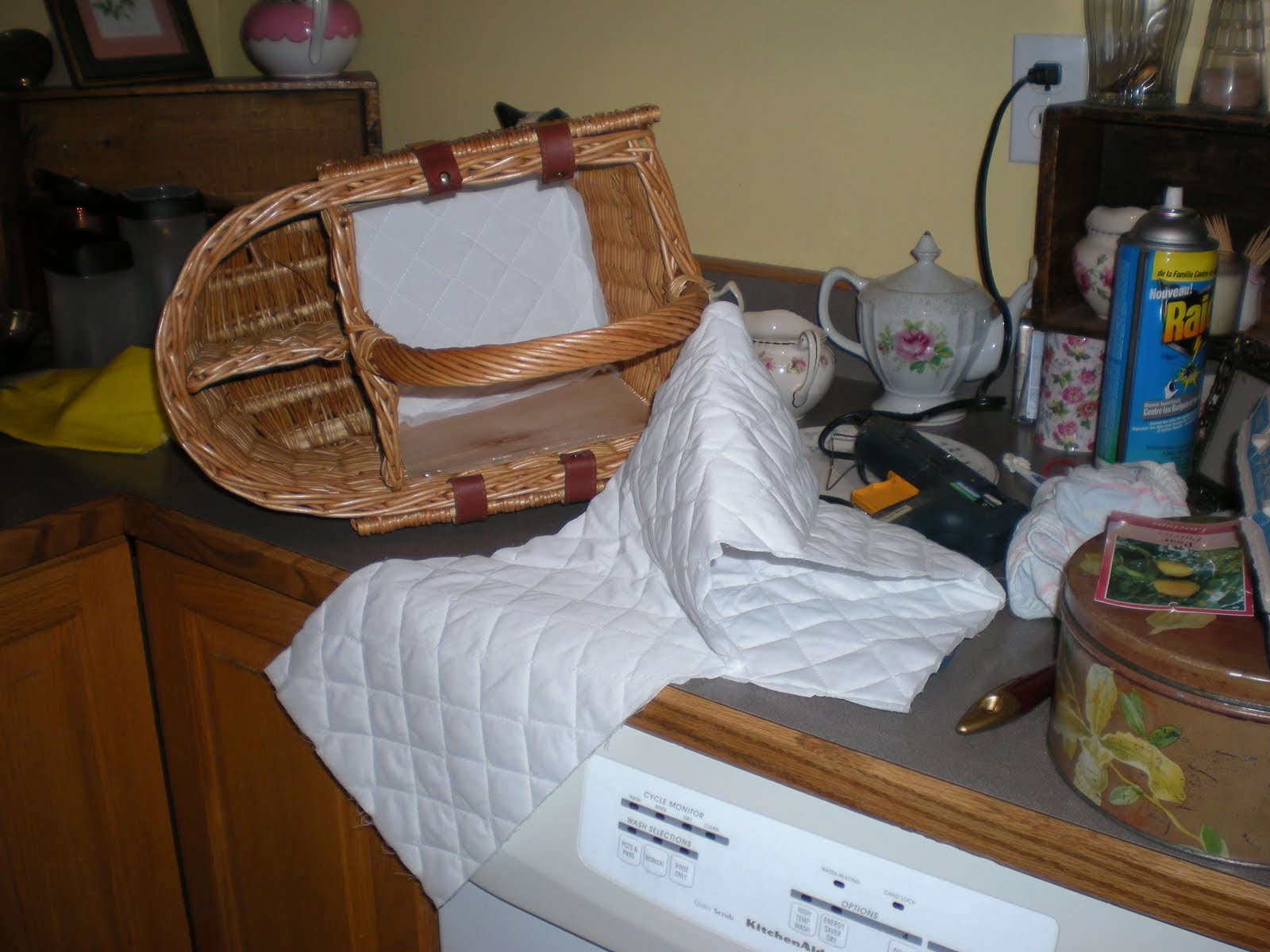 Laura's Rose Garden Revamping an old Wicker Picnic Basket.