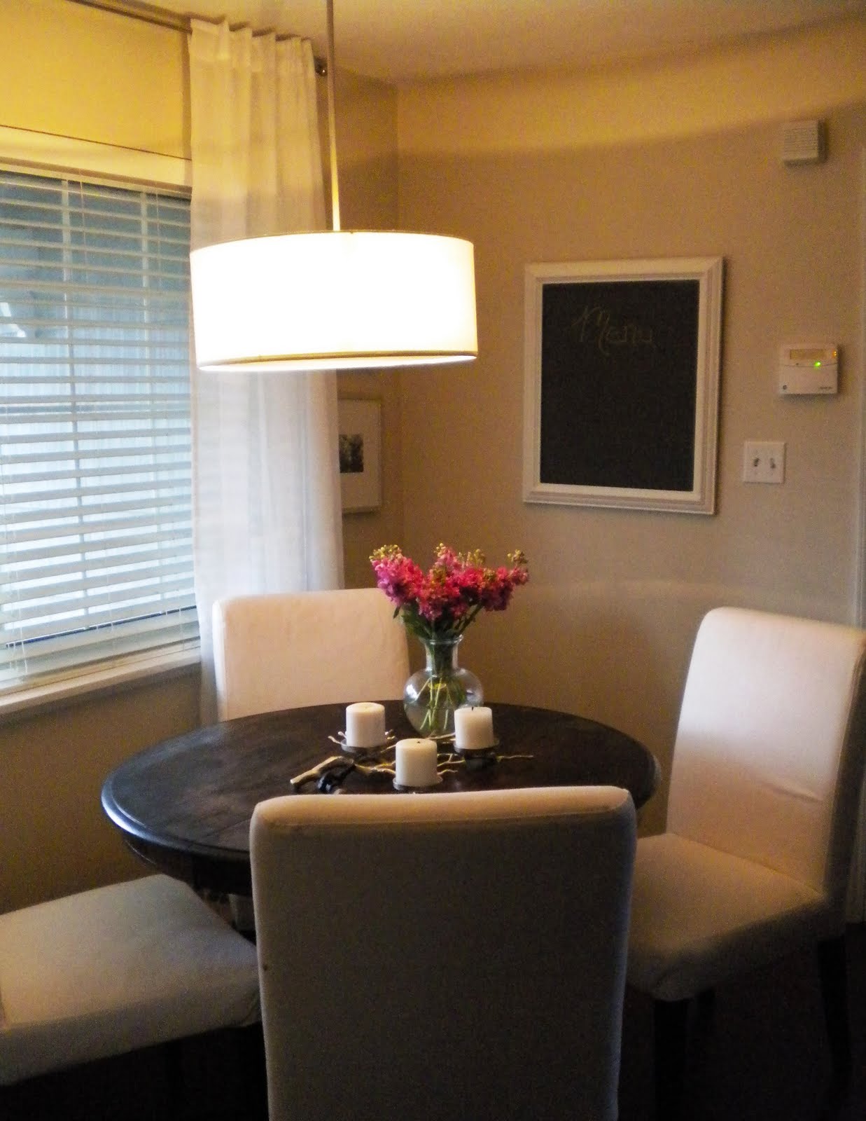 Mirror over dining room table. awesome black fur dining room rug ...