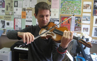 Violin professor takes center stage