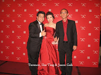 An image of the newly weds Terence and She Ting with live band manager Jason Geh