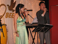 Sharon's sister and a friend singing along with the wedding band