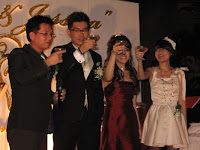 The wedding couple having a toast with their guest
