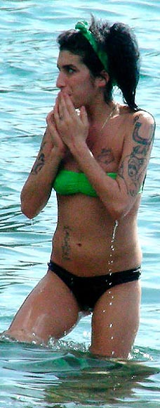 Stressed Amy Winehouse has jetted off to the Caribbean
