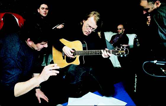 [M098.chriseckman-raindogs.jpg]