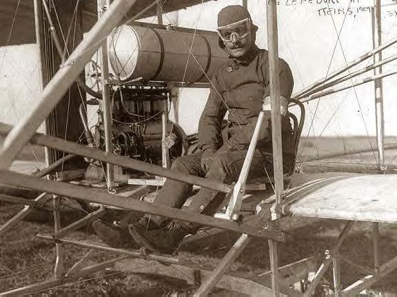 Eugene Lefebvre in plane at Reims, France. 9-1-1909