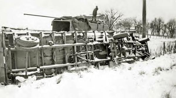 Akron Motor Cargo Co. Wreck. Earl Sowers standing on top of a trailer. 4-1-1936