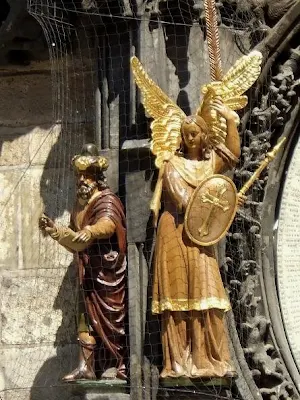 chronicler and angel of Astronomical Clock in Prague