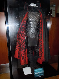 Hollywood Movie Costumes And Props Alice In Wonderland Dresses And Stayne Costume On Display