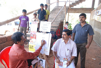 cartoonist MR. VENKAT BHAT EDANEERU AT TULU AYANO-2009 HELD AT KASARAGOD,BADIYADKA