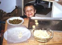 Henry Making Baked Cheddar Olives c 1998