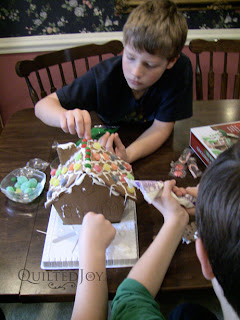 Kidlets building Gingerbread Houses - QuiltedJoy.com