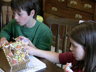 Kidlets building Gingerbread Houses - QuiltedJoy.com