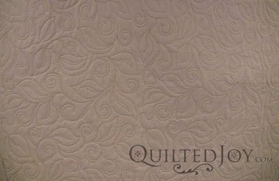 Great look for a masculine quilt! Edge to edge quilting by Angela Huffman - QuiltedJoy.com