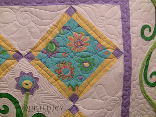 Playful Purple Daisy with custom quilting by Angela Huffman - QuiltedJoy.com