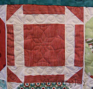 Snowflake Latte Quilt with custom quilting by Angela Huffman - QuiltedJoy.com