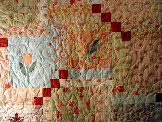 Pretty Posies pantograph on Joan's Layer Cake quilt - QuiltedJoy.com