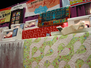 One of Angela's quilts on display at Paducah ;) - QuiltedJoy.com