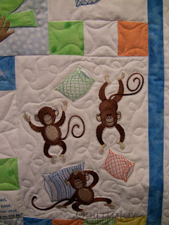 Monkeys on the Bed Quilt, with custom quilting by Angela Huffman - QuiltedJoy.com