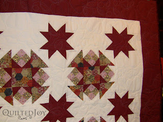 Apple Orchard Quilt with edge to edge quilting by Angela Huffman