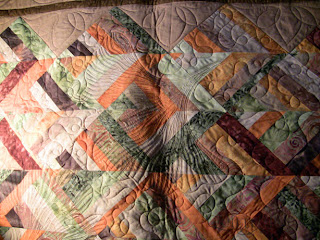 Batik Chevrons with custom quilting by Angela Huffman - QuiltedJoy.com