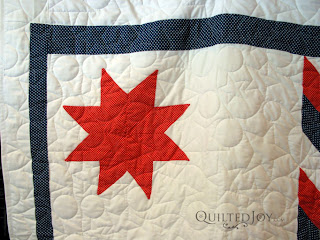 Patriotic Lone Star Quilt with stars and loops edge to edge quilting - QuiltedJoy.com