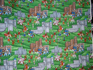 Fun knights and castles quilts, perfect for a grandson! Angela Huffman quilted the Funky Fleur de Lys pantograph - QuiltedJoy.com