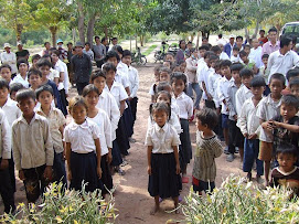 Takeo Village Children Line Up for Bicycles