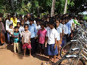 Children Line Up to Receive Rotary Bikes!