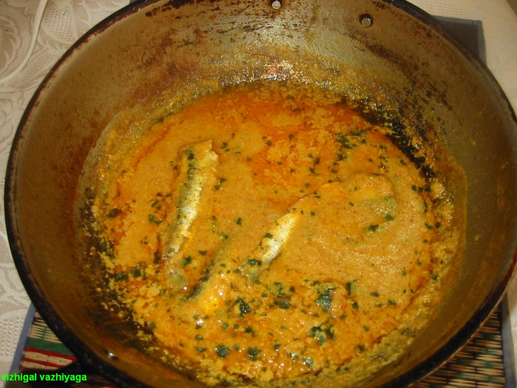 En veetu Sarshe sardines ( Sardines in mustard gravy