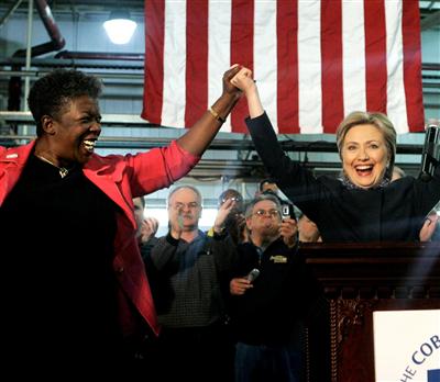 [Tubbs+Jones+and+Hillary+clasping+hands-HomepageImageComponent.JPG]