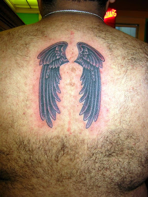 black angel wings tattoo
