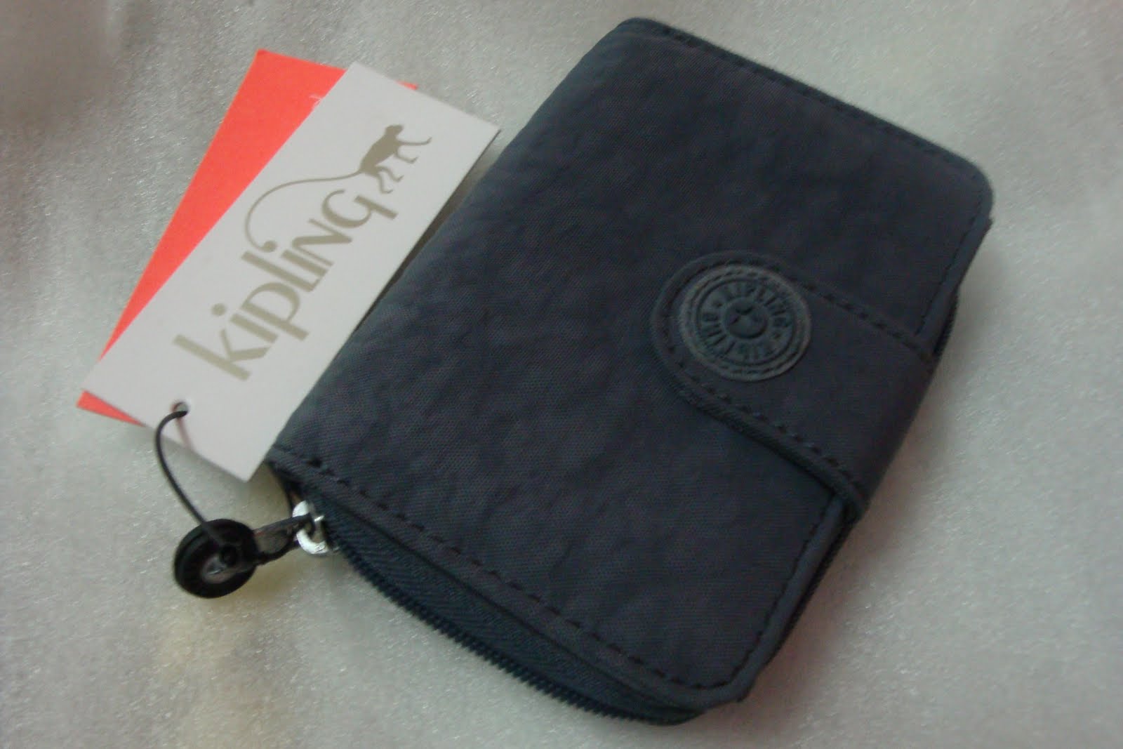 Kipling wallet Lookup BeforeBuying