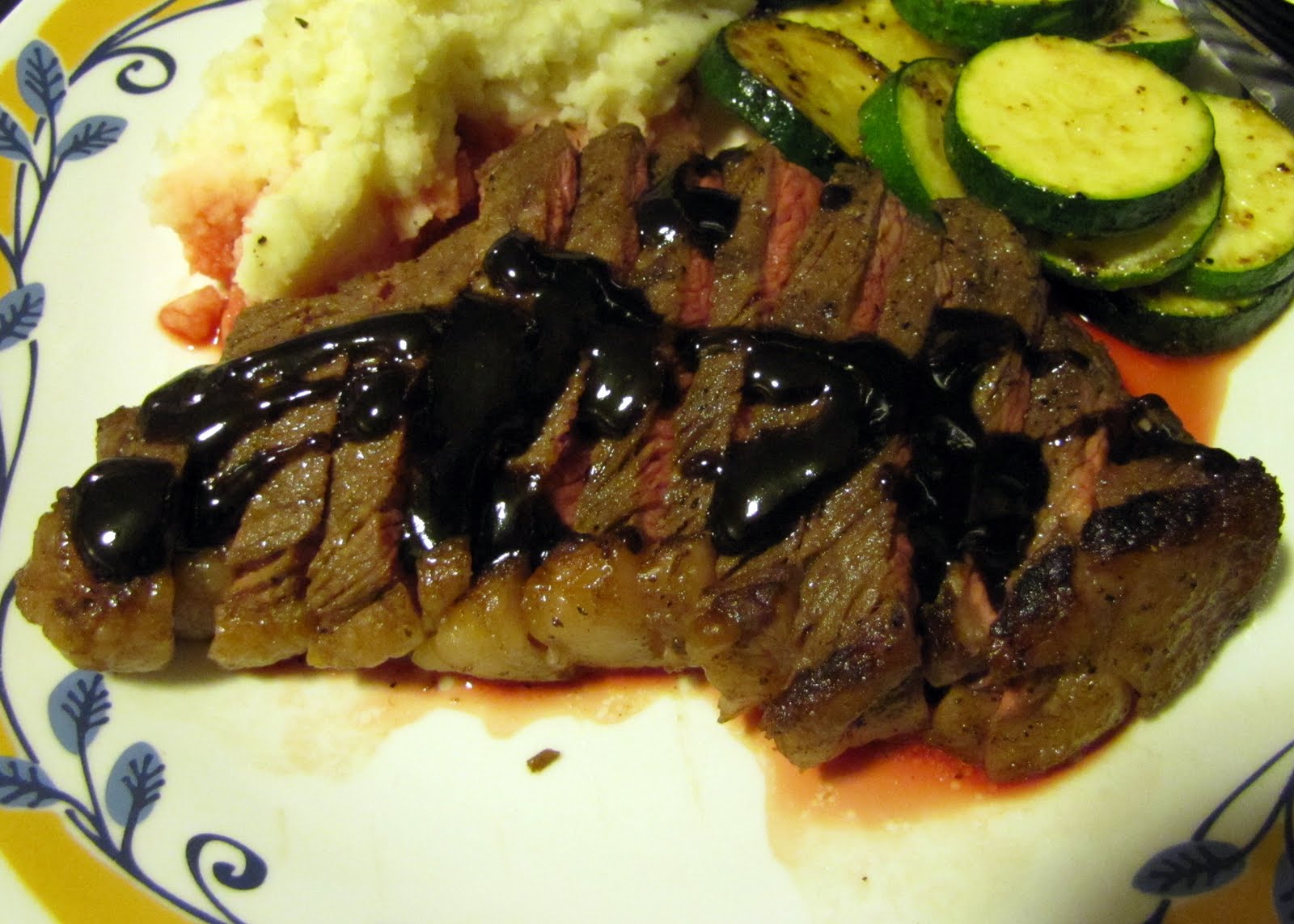 [steak+topped+with+bourbon+reduction.jpg]