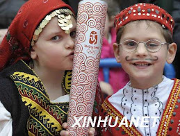 Olympic torch in China and Greek kids