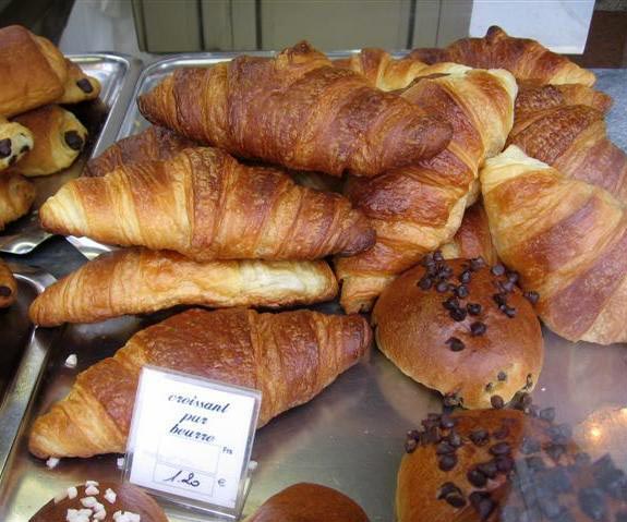 Pile of golden Parisian croissants