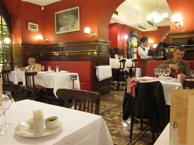 Red interior of Bocuse restaurant in Lyon
