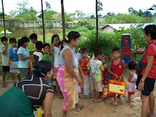 CHILDREN WAITING TO RECEIVE