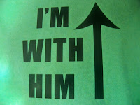 Western slang article with I'm with Him sign