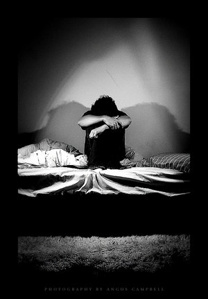 [depressed+guy+on+bed.jpg]