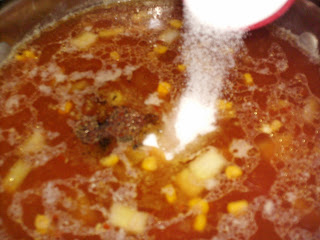 Add sugar and simmer southern chicken stew.